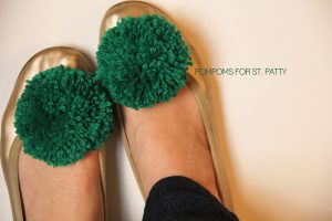 DIY a fluffy green pompom and clip it on your child's shoes to add some pizzazz to her St. Patrick's Day Costume